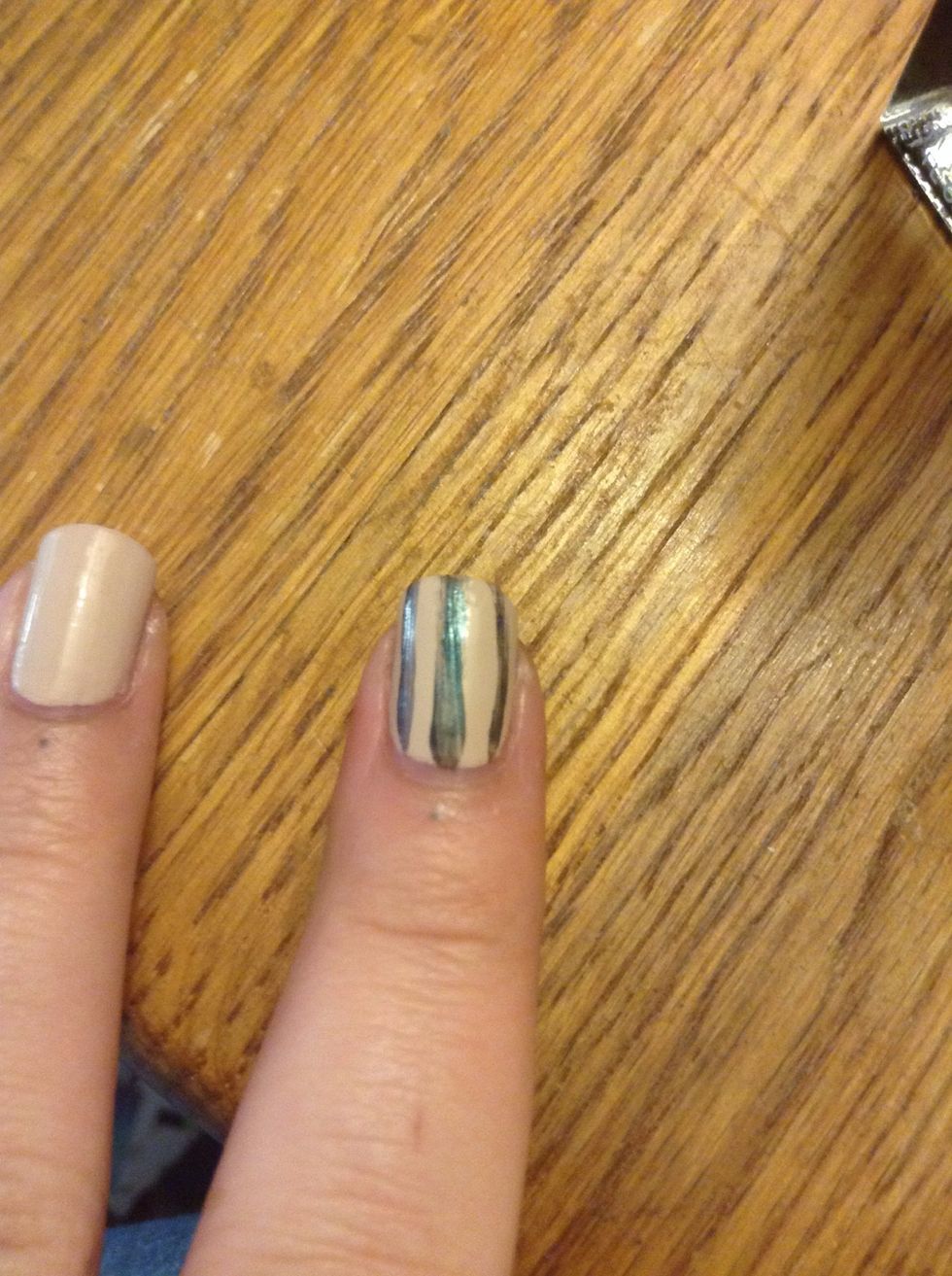 Paint three lines across your nail. It doesn't really matter what direction you do them in.
