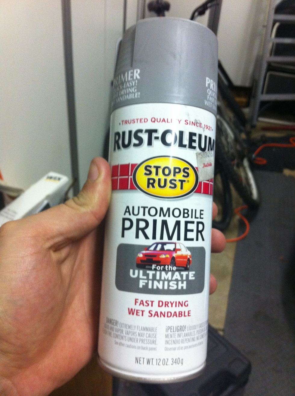 Paint two layers of primer, letting it dry for 30 Minutes in between coats.