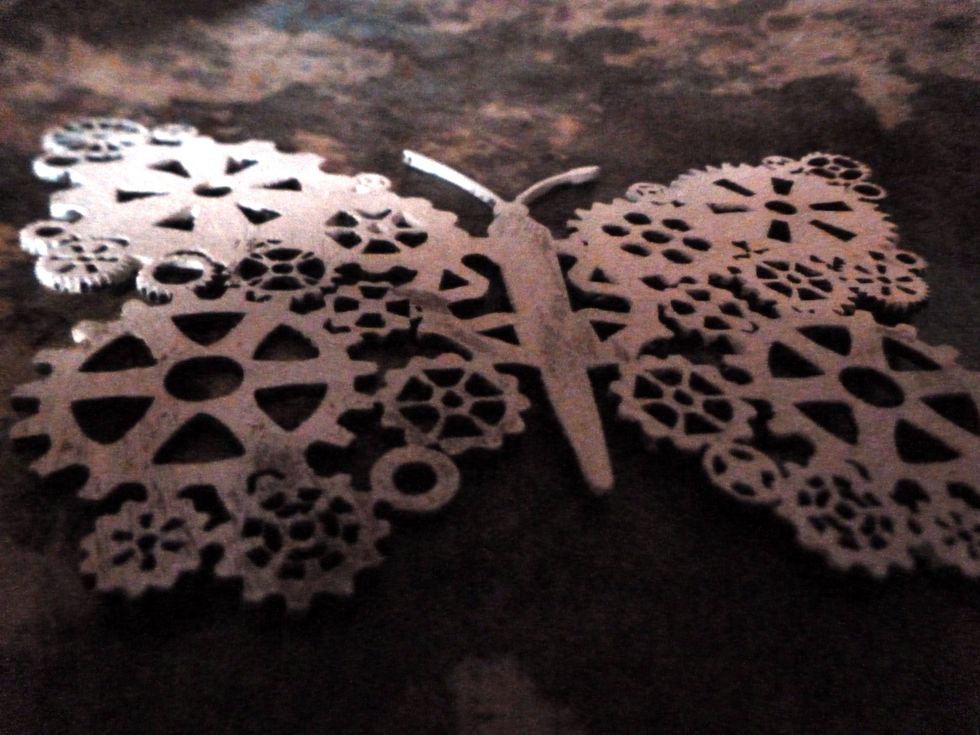 Paint with gesso. I like to do some heavier and some lighter with the gesso to get different effects with the next step.