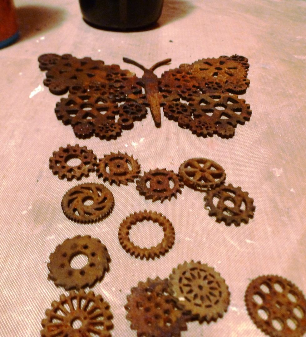 Paint with Modern Masters Metal Effects Iron paint. Let dry 1/2 hr. Apply second coat. Let dry 1 1/2 hrs. Add Modern Masters Metal Effects Rusting solution. Wait 5 minutes add again. Let dry.