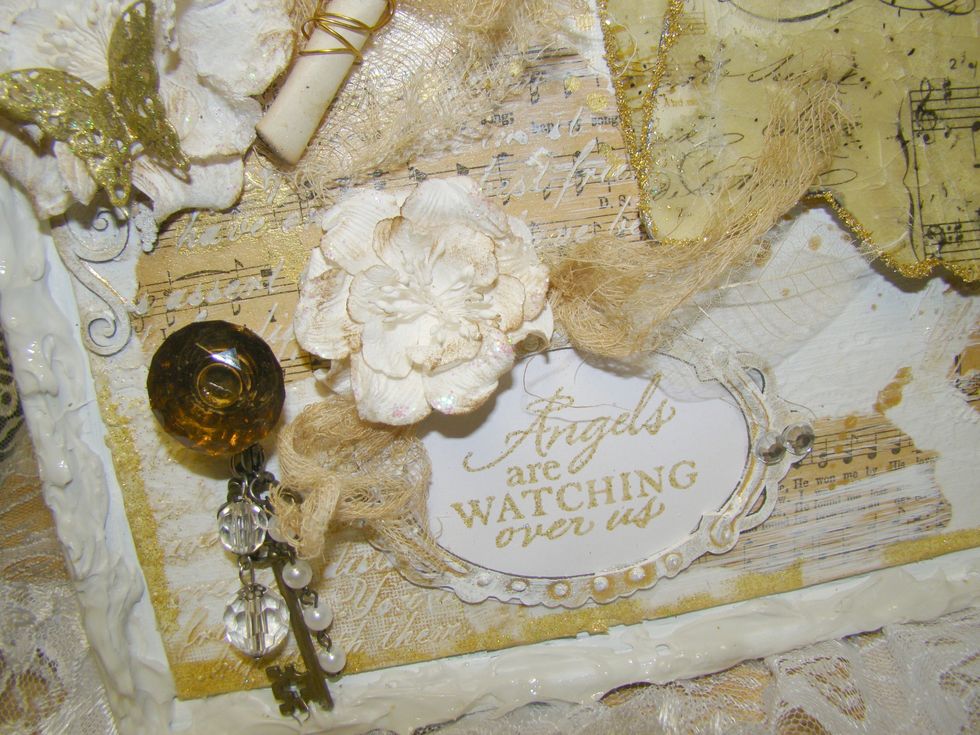 Paint your chipboard frame and highlight with Heidi Swapp gold spray. Adhere your sentiment to the back