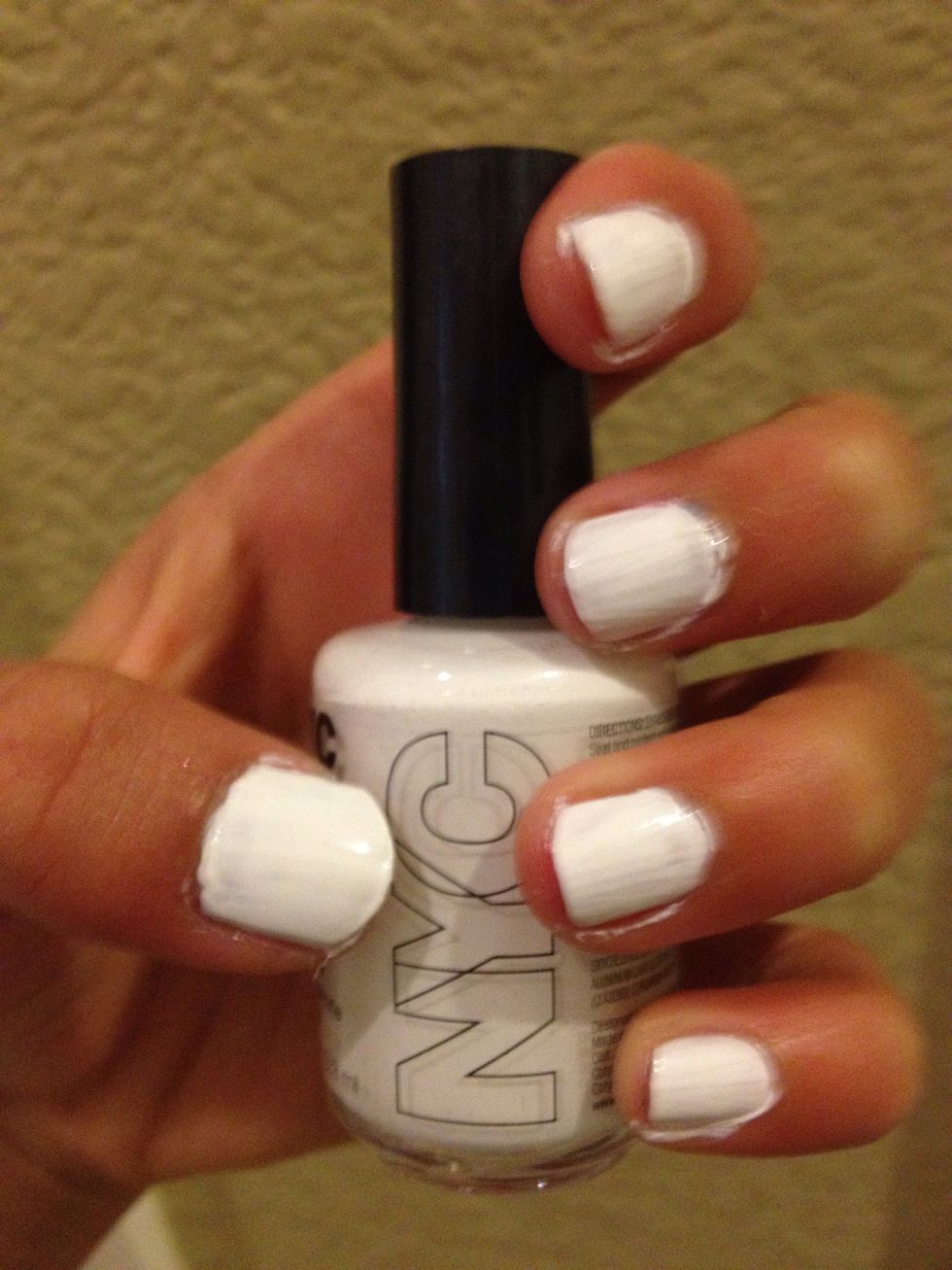 Paint your cleaned nails a basecoat of white. Apply more coats if needed