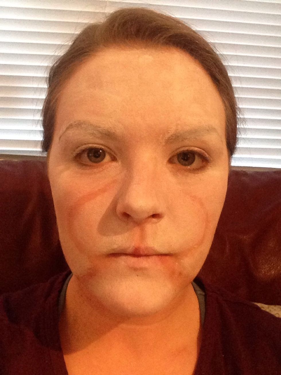 Paint your face slightly white all over