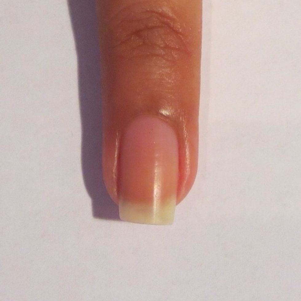 Paint your nail with a clear base coat
