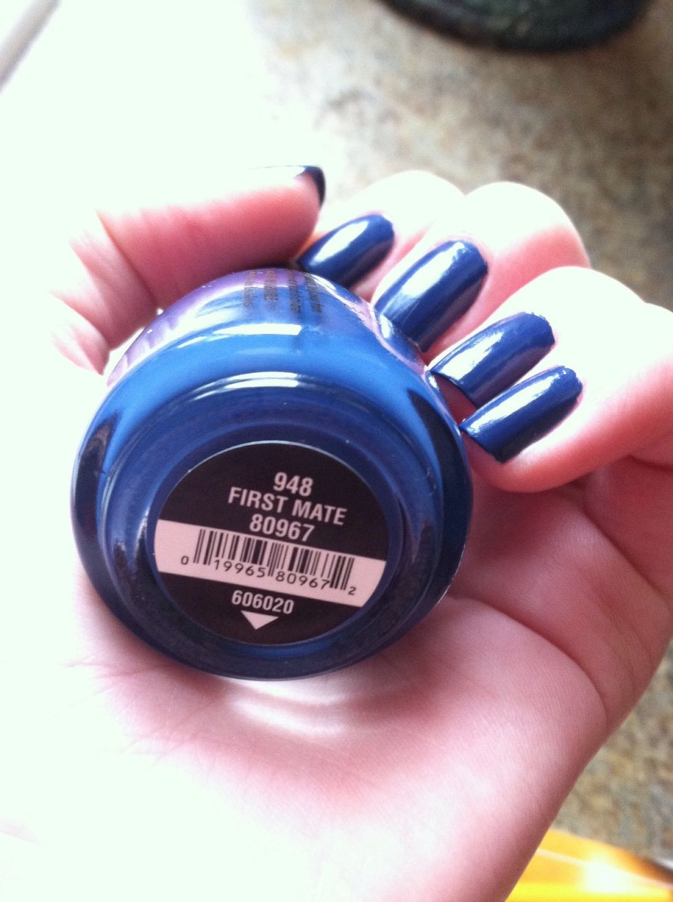 Paint your nails a dark blue.