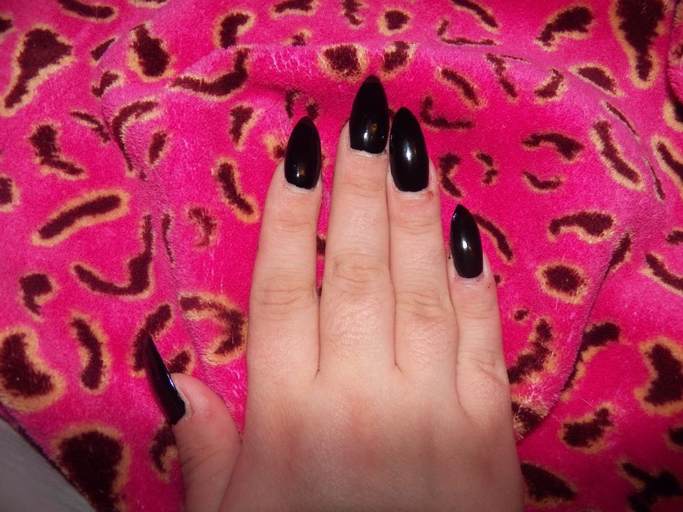 Paint your nails black.