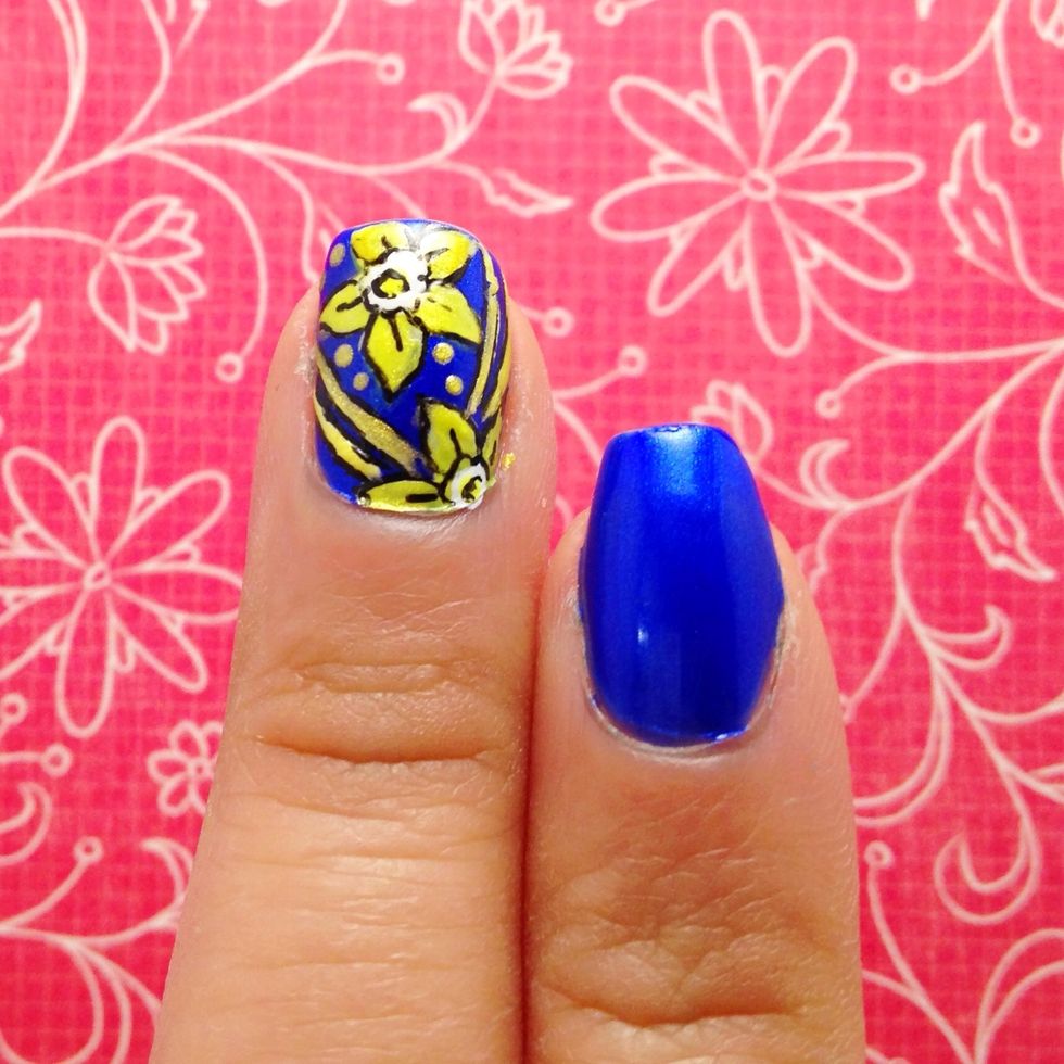 Paint your nails in a shimmery blue polish.