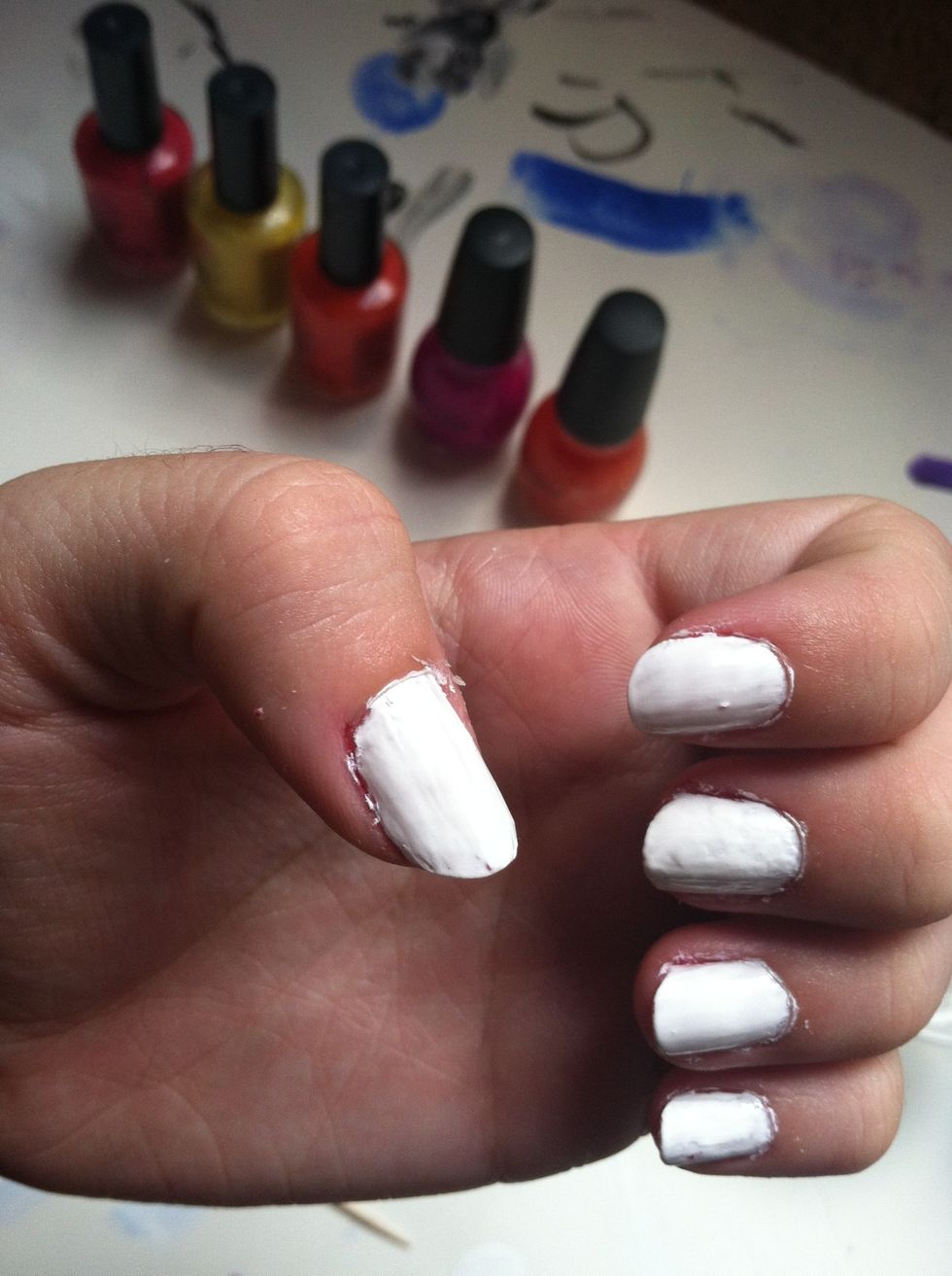 Paint your nails white. Let them dry! You probably could paint them a lot neater than I did.