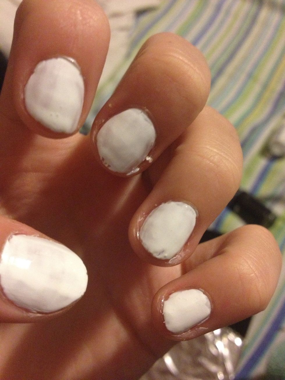 Paint your nails white then add a top coat