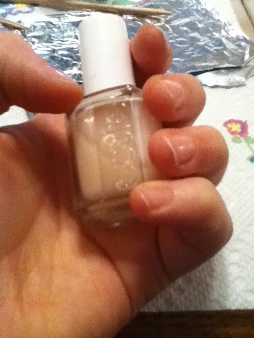 Paint your nails with a basecoat or strengthener of your choice! This will not affect the design:)