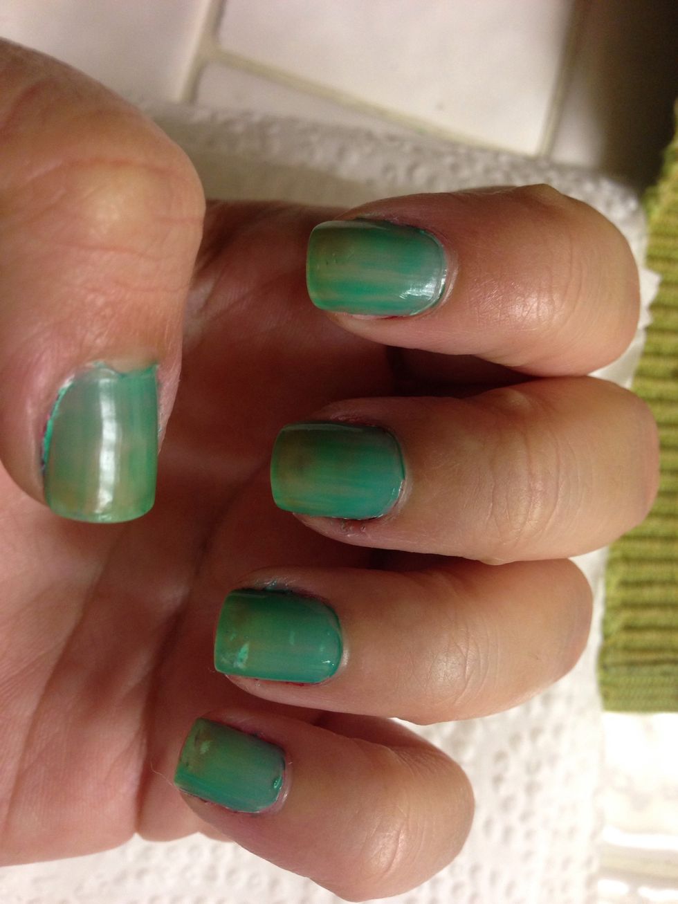 Paint your nails with one coat of a solid color