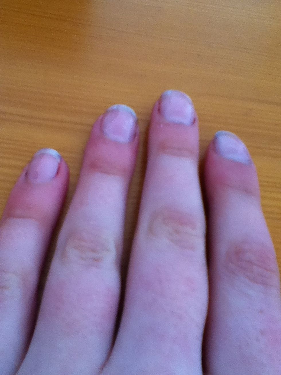 Paint your nails with the base coat and leave to fully dry.