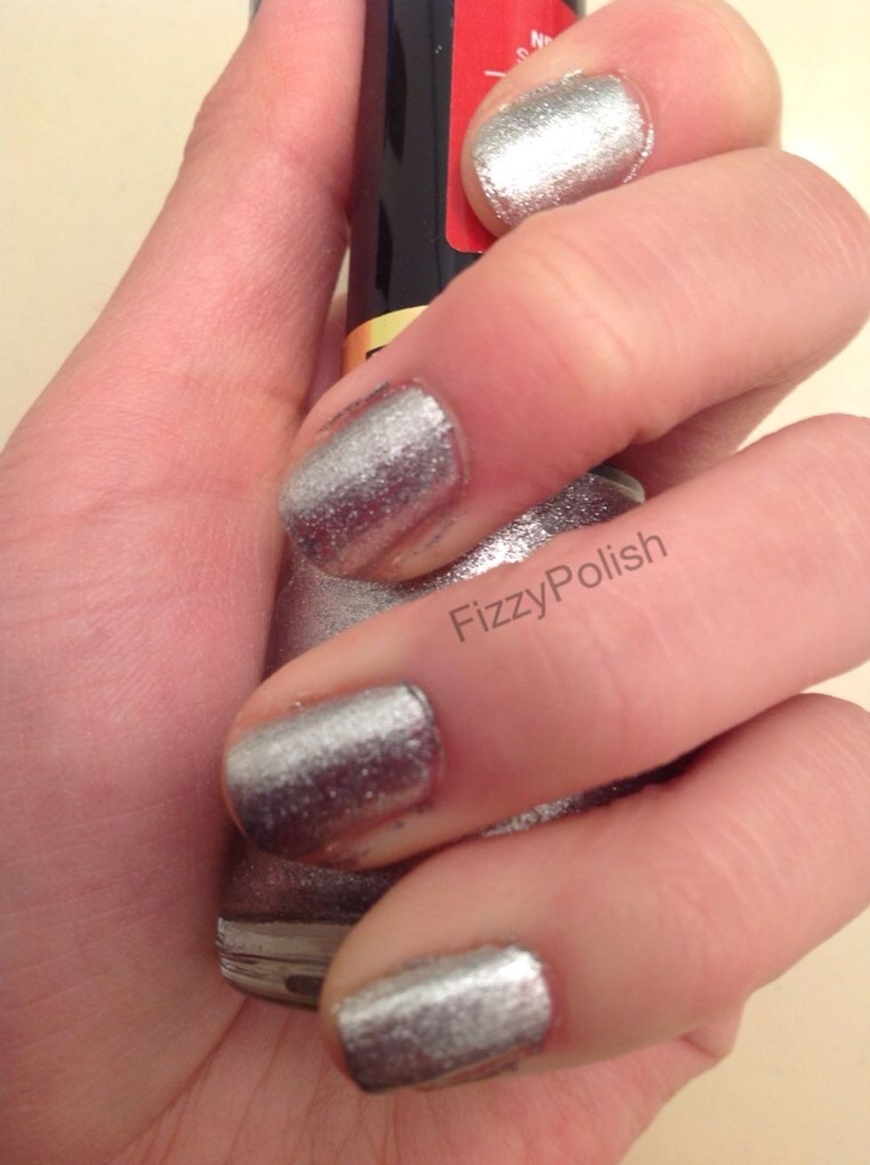 Paint your nails with two coats of your first polish.