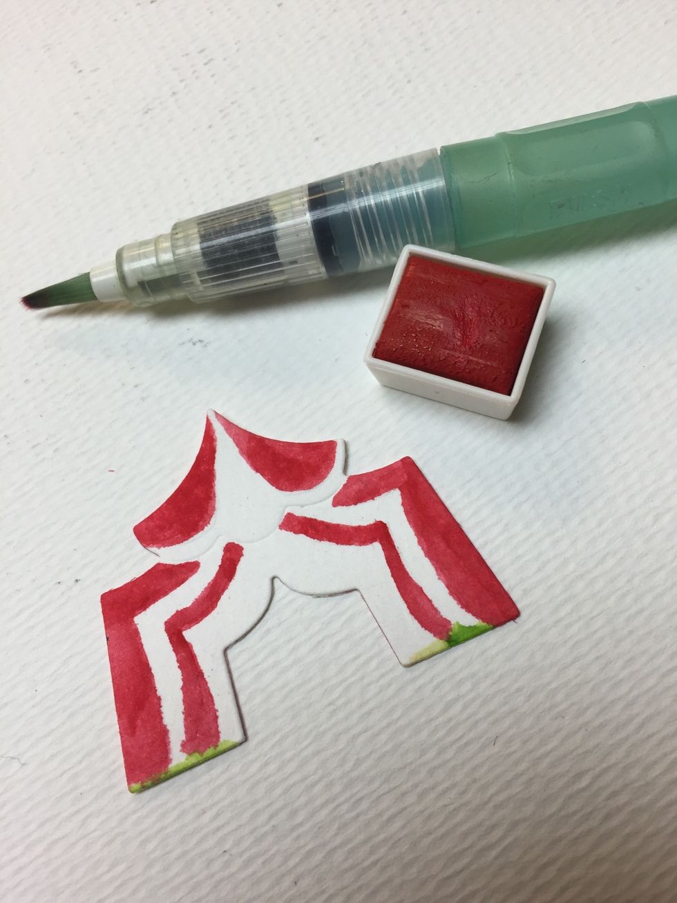 Paint your tent. The cool thing about the Spellbinders dies is that on the watercolor paper they will be embossed! Your stripes are already marked for you!