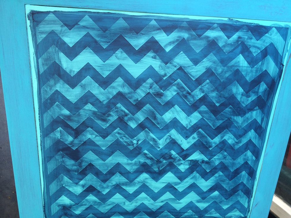 Painted all in blue. Now to remove vinyl. (I wouldn't want that much vinyl to stay- it could get damaged and mess up table. That's why it's just a stencil for me)