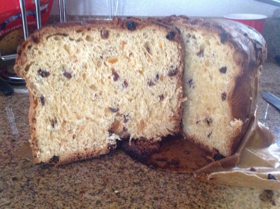Panettone has a long process that involves curing the dough. The proofing process takes days. It has candied orange, citron, lemon zest, and raisins. It has a cupola shape. Cut in slices.