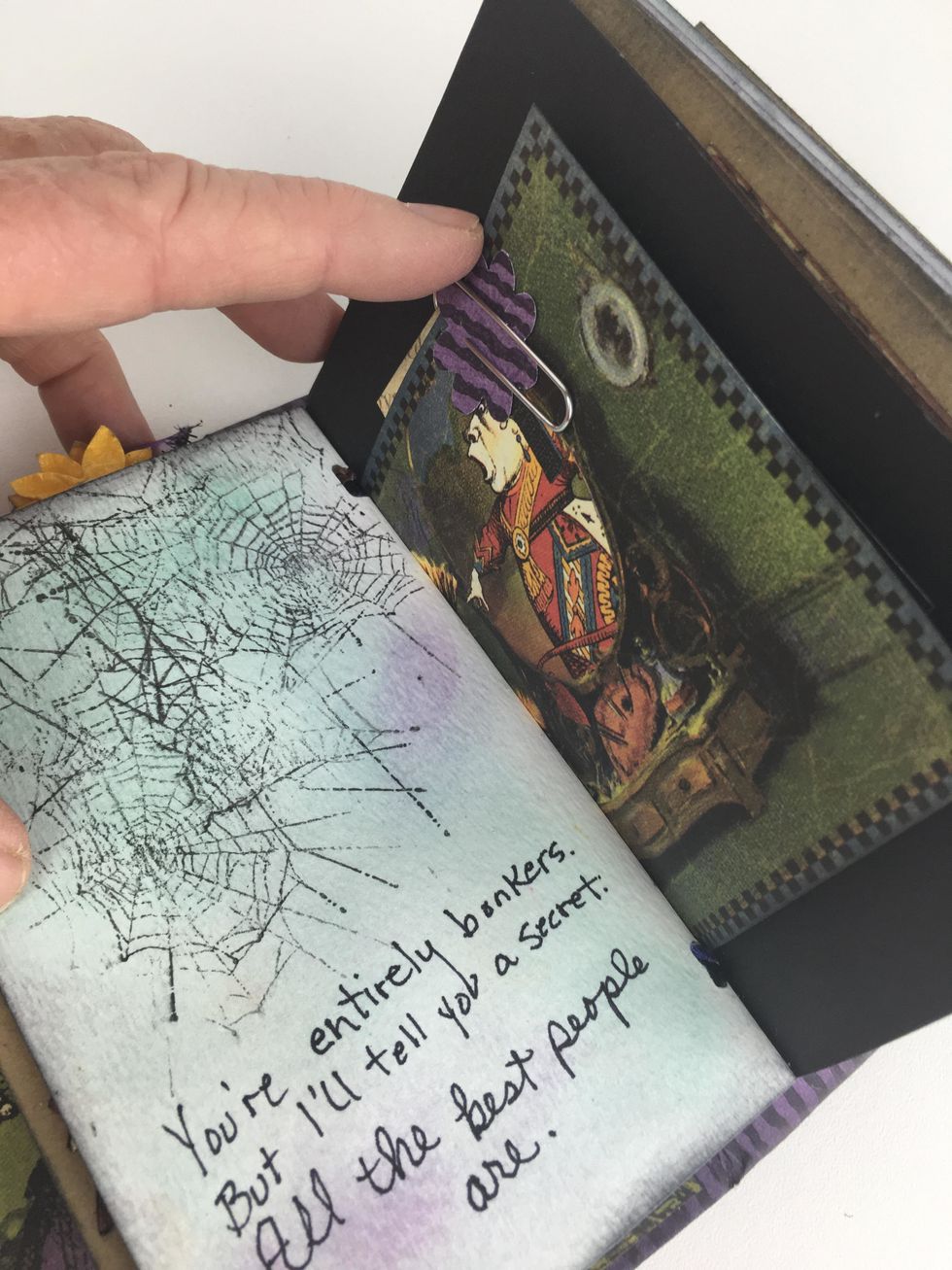 Paper clips and paper flowers are a good addition to your junk journal book.