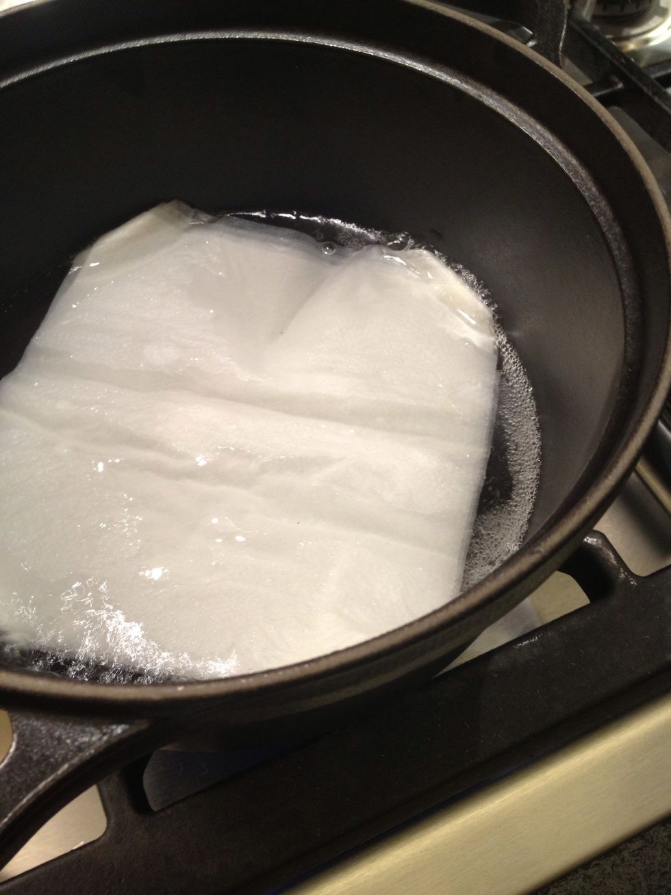 Paper napkin. The napkin prevents the ramekins from sliding.