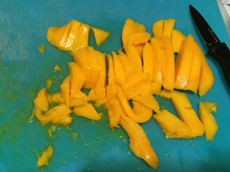 https://guides.brit.co/media-library/part-3-assembly-u2013-remove-skin-from-mango-and-slice-it-up-leave-a-good-9-pieces-for-the-top-layer-to-decorate-the-rest-c.jpg?id=23660447&width=784&quality=85