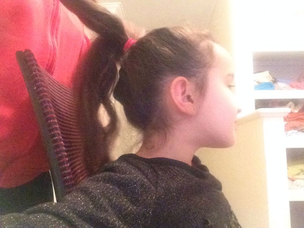 Part your hair into 3 parts