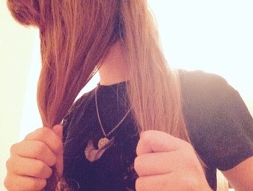 Part your hair into two sides