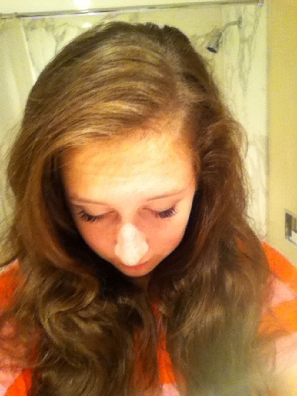 Part your hair to your side of choice, to the outside corner of the eye.