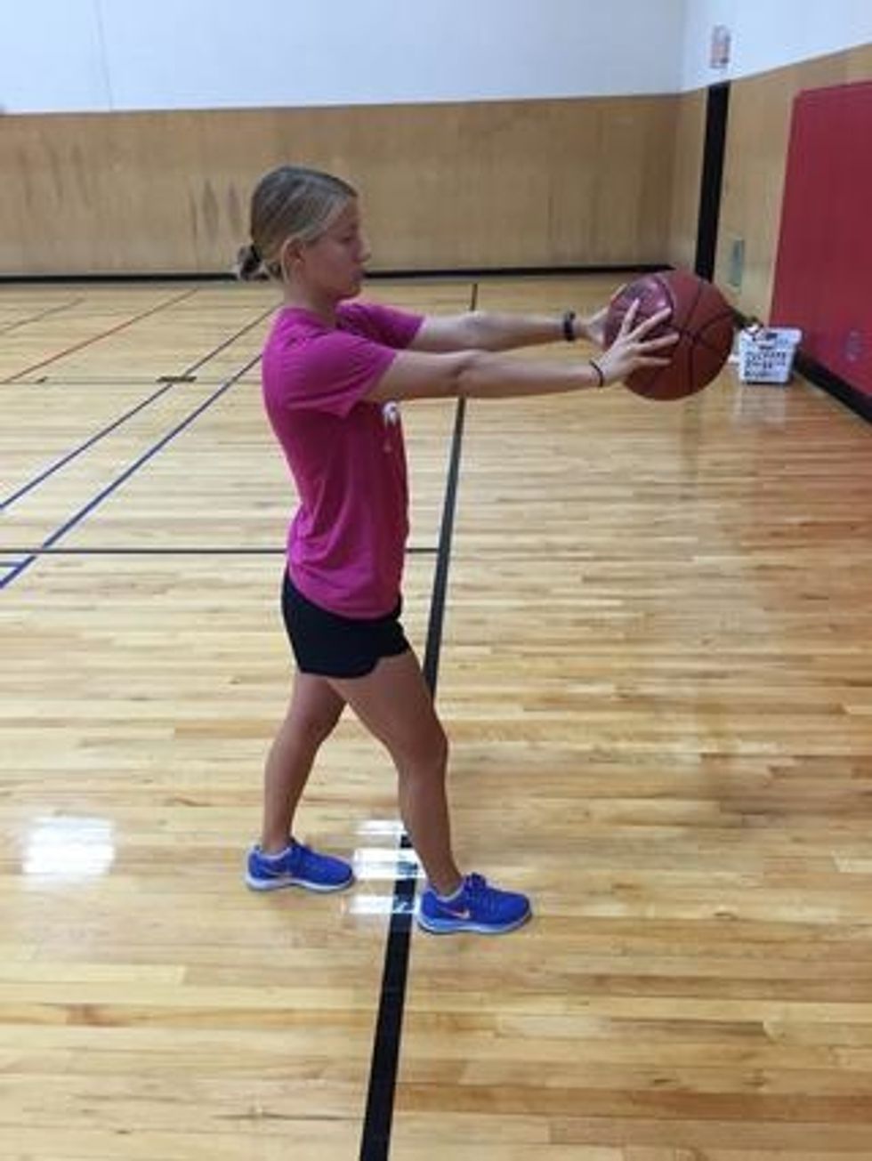 Pass Extend arms like shooting