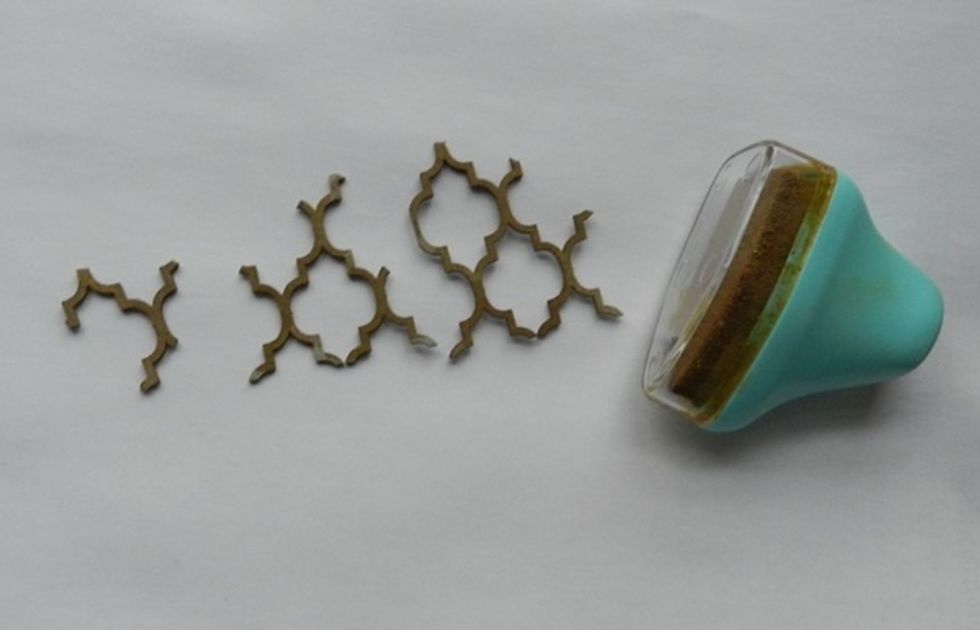 Pass gold ink pad on Maroccan chipboard.