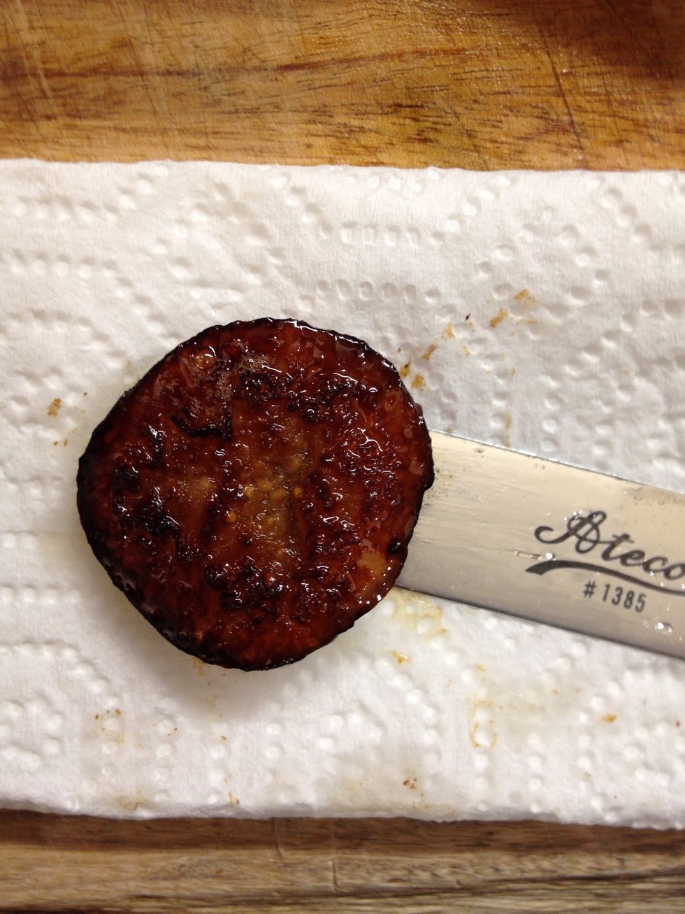 Pass it throw kitchen paper to absorb the excess fat