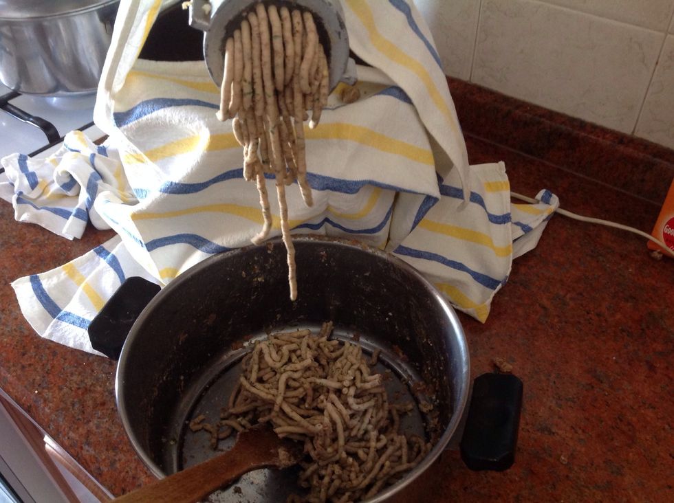 Pass the mixture through the mincer for the second time using a narrower grinding hole plate