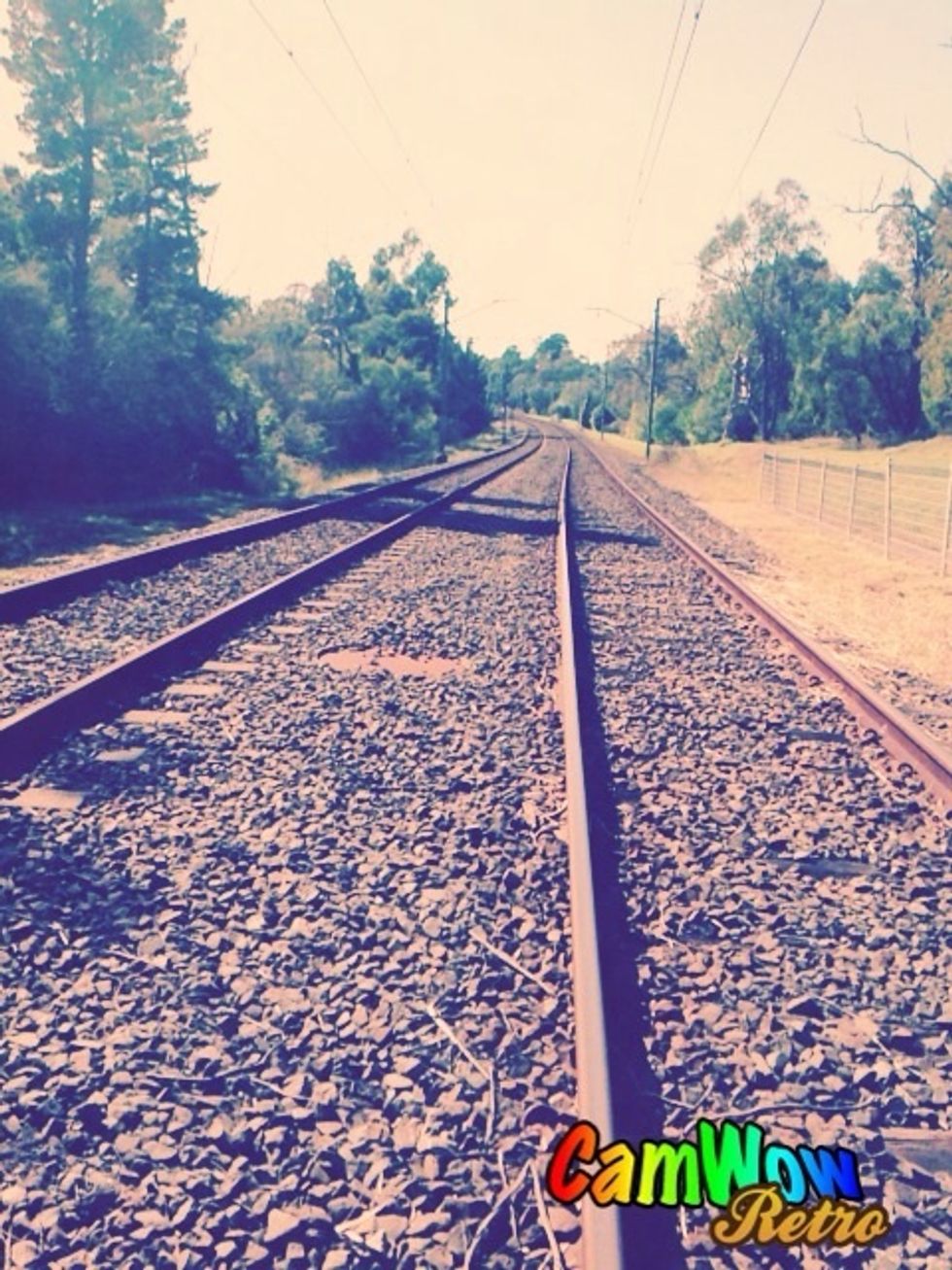 Pass the train tracks.