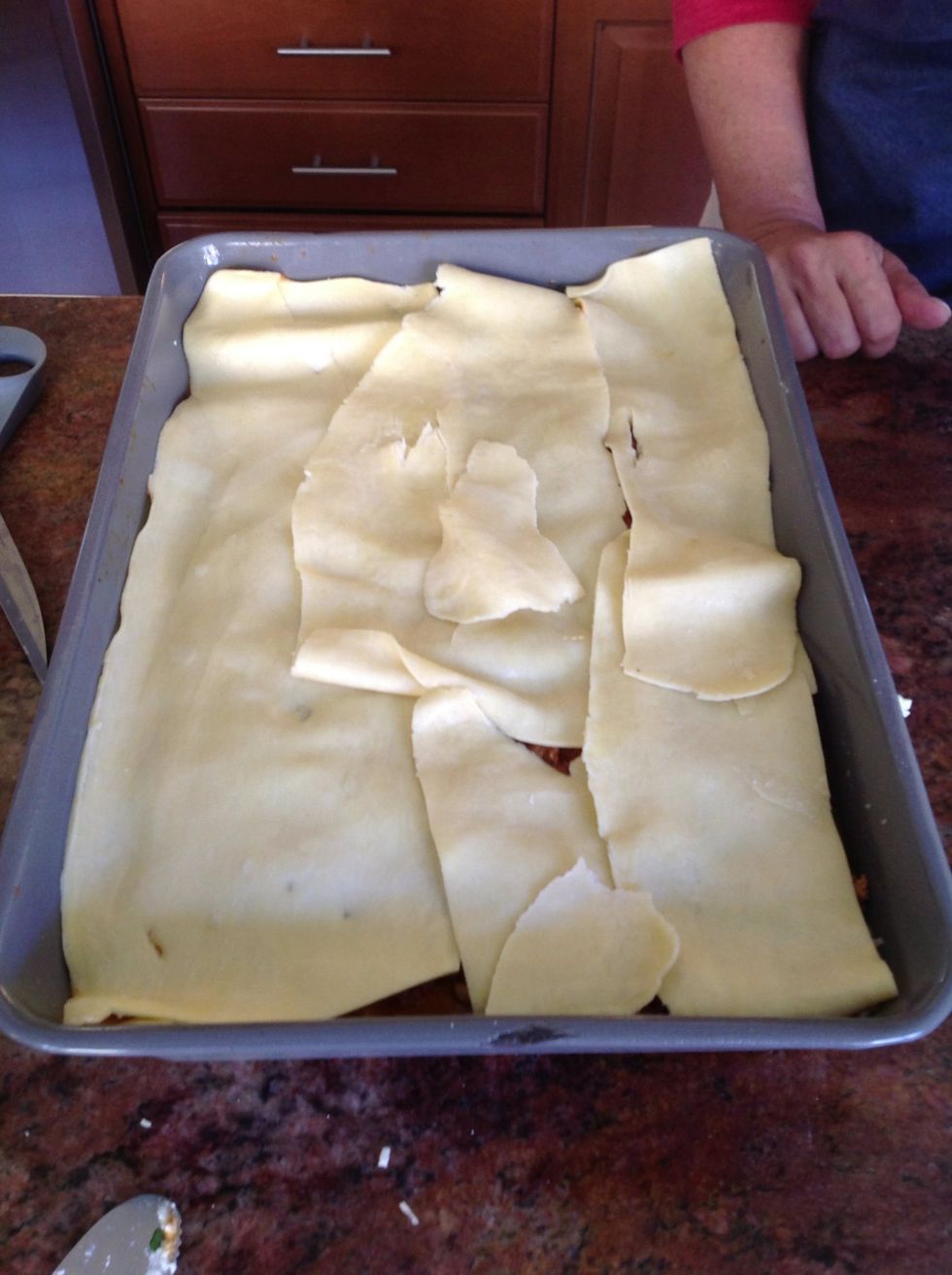 Pasta layer # 3. See how we cover the holes. It's our secret......