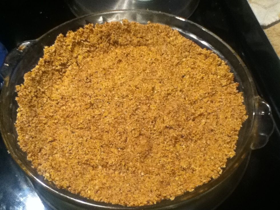 Pat almond mixture into pie pan and put in oven at 325 for 10 minutes