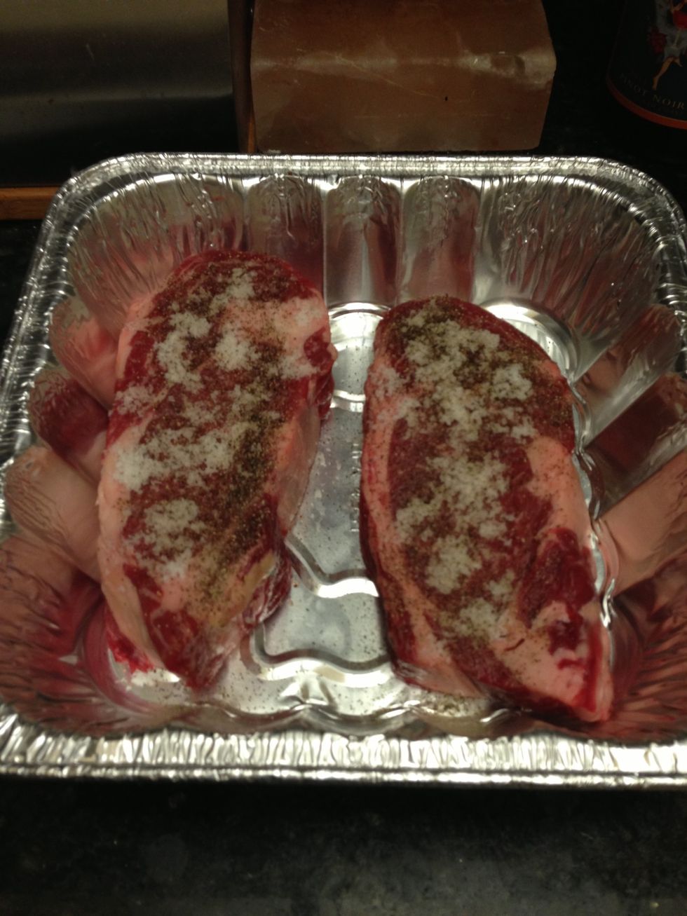 Pat down steaks with a paper towel to remove moisture and season generously with sea salt and pepper (don't be shy). You want to pat the seasonings into the meat. Repeat for the other side.