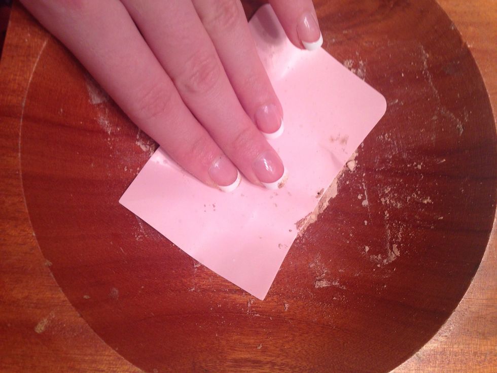 Pat down with a piece of paper.