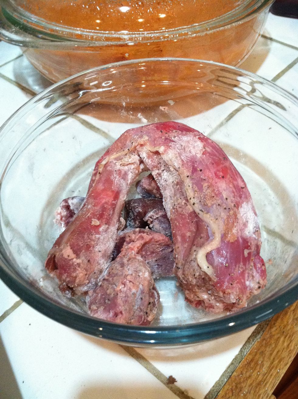 Pat neck and giblets dry with a paper towel. Season with salt and pepper and then coat them in 2 Tbsp of flour.