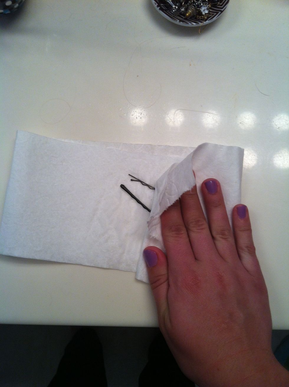 Pat the excess hairspray off of the pins so they don't get to sticky
