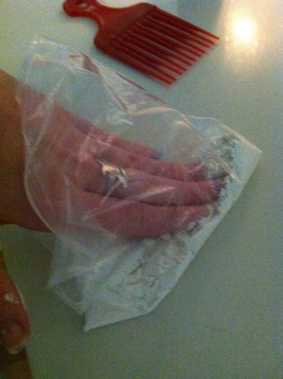 Pat the flour ( or any powder you're using) with your finger tips. I find flour better also because it doesn't leave that white residue on my roots like baby powder.