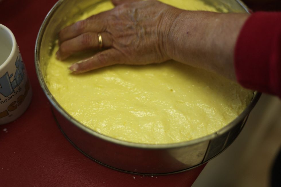 Pat the mixture down until it's completely flat.