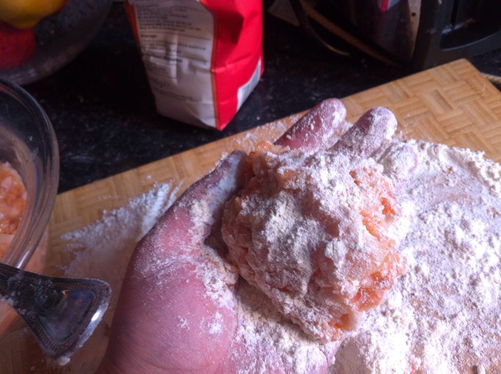 Pat the mixture in your hands, making flat circle shapes. This is very messy!