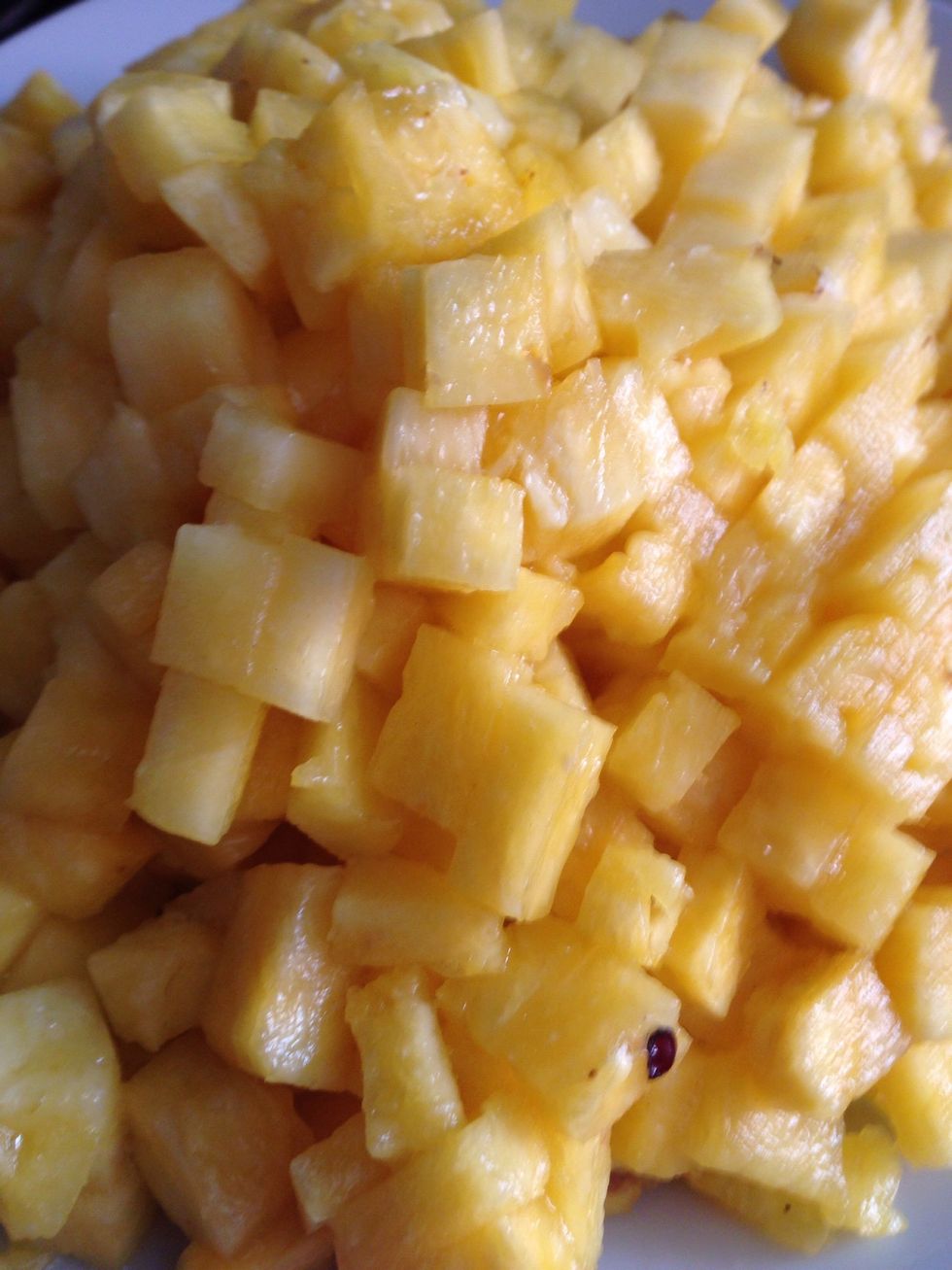 Peal and dice the pineapple