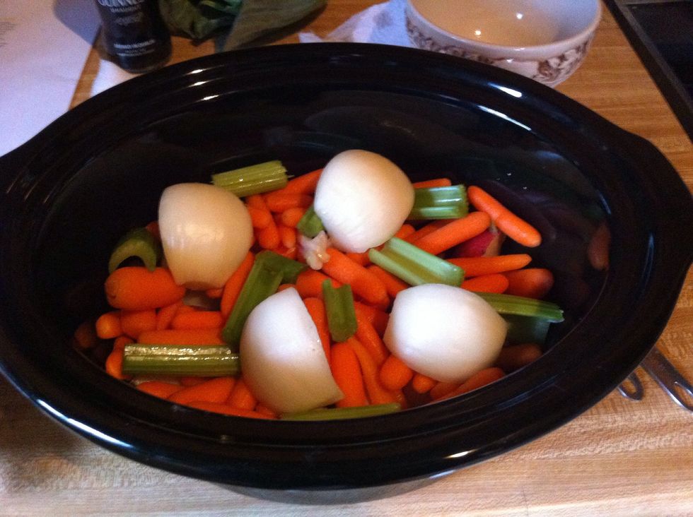 Peal and quarter one small onion; I used a yellow onion. Add to crock pot