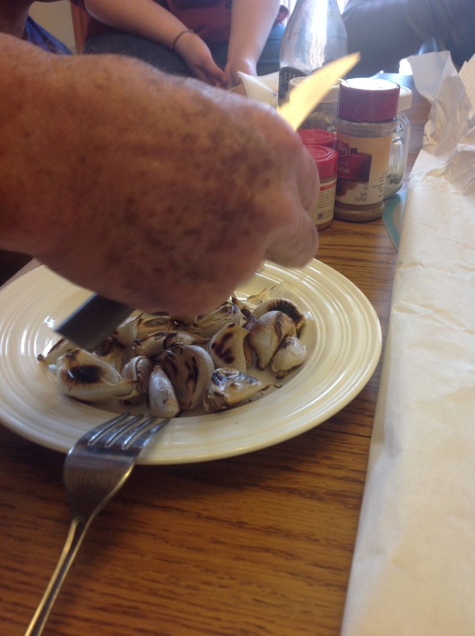 Peal off outside of the garlic