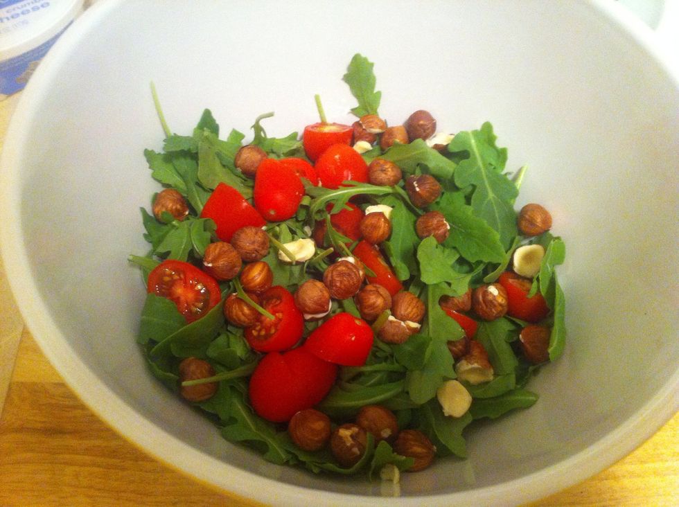 Peanuts belong in bars and baseball parks. Hazelnuts belong in delicious meals like this.   Add a handful of these more distinguished nuts and the tomatoes to your GIGANTIC bowl of arugula.