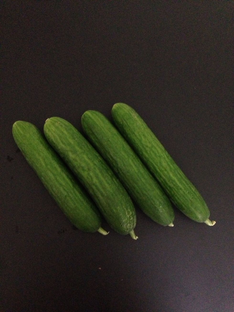 Peel 2 cucumbers