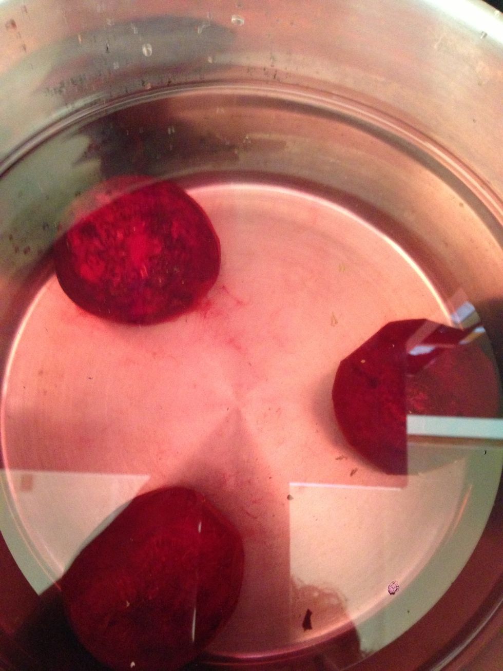 Peel 2 or 3 medium sized beets and put them in cold water. Cook until beets are soft. Add a few bay leaves and three peppercorns. Add three teaspoons of salt.