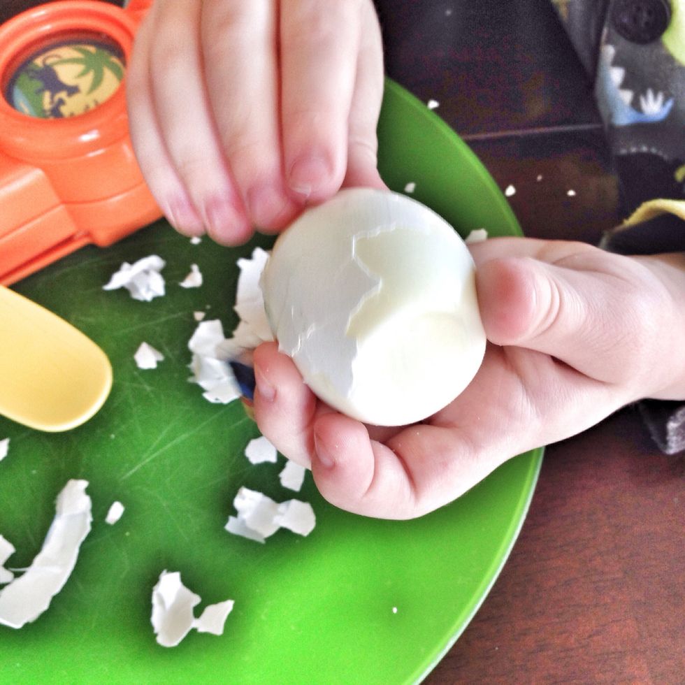 Peel a hard boiled egg. Kids love doing this!