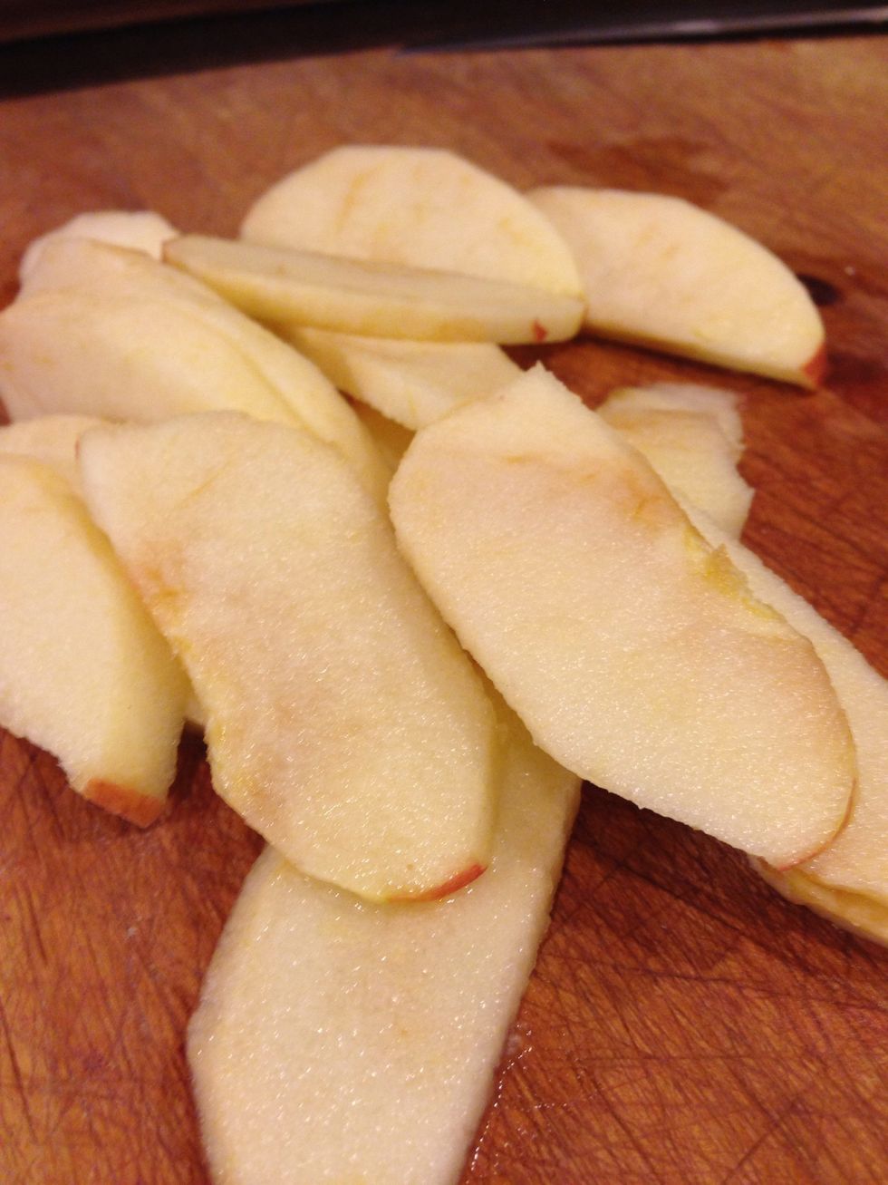 Peel and chop one apple, sprinkle with lemon juice.