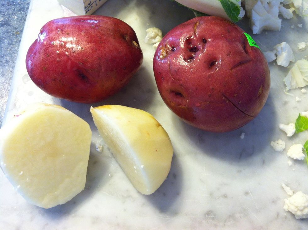 Peel and chop potatoes