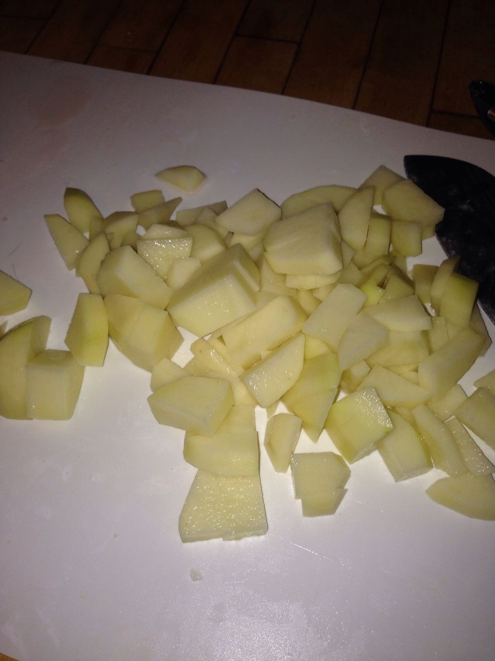 Peel and chop your potatoes.
